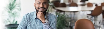 Image of a smiling male employee