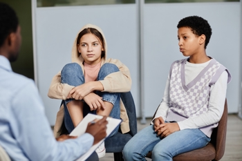 teenagers at a GP consultation