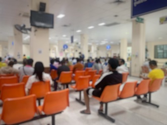 Patient delays in a waiting room due to disconnected systems.