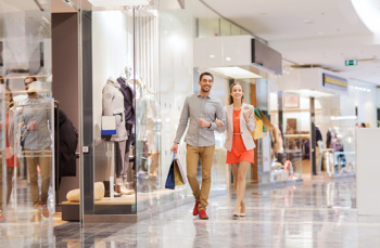Couple walking in a shopping centre