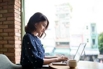 woman working on her laptop