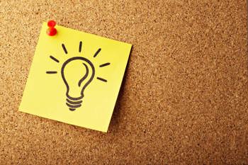 Post-it note with a light bulb drawn onto it