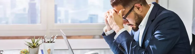 Image of stressed office worker
