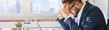Image of stressed office worker