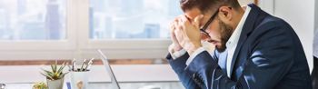 Image of stressed office worker