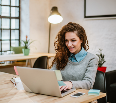 Women looking at Access CRM software