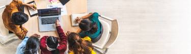 Image of a team meeting