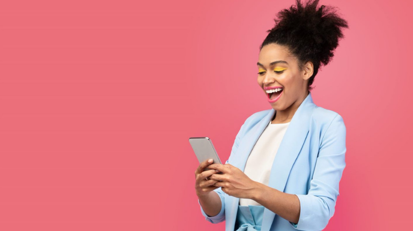 Woman On Mobile Pink Background 820 X 460 Px (1)