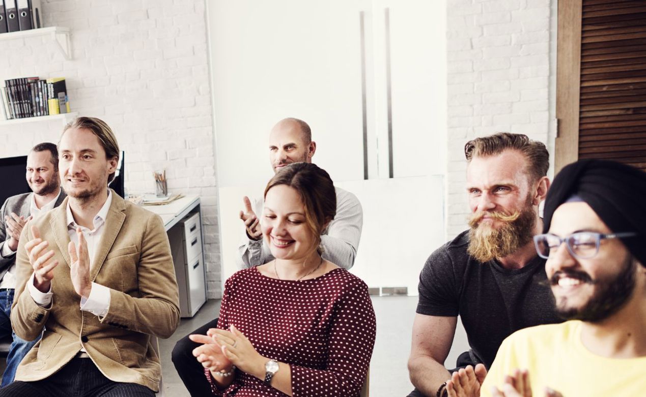 team meeting happy employees