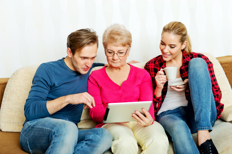 people looking at a tablet
