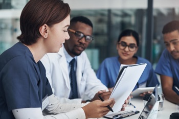 doctors and nurses hosting a meeting