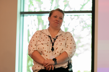 Beth Askwith talking on stage at access group social care conference 2025