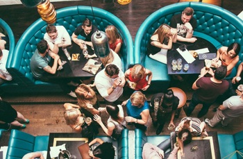 A room full of people at a restaurant 
