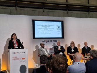 Session speakers discussing cyber at rewired 2026