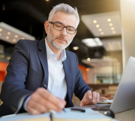 Man using construction ERP software