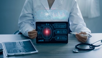 Clinician holding ipad displaying different human body metrics