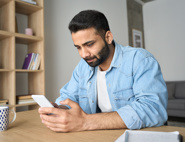 A man looking at his phone