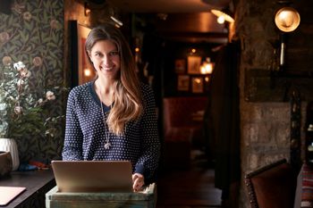 Woman at registration computer