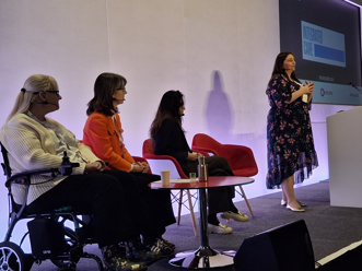 Laura thompson discussing neighbourhood care at rewired 2026