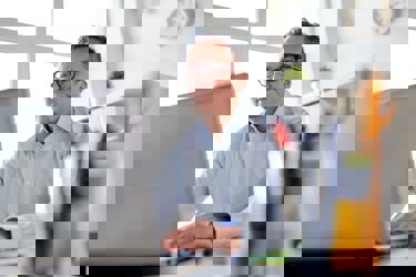 Man working on his laptop in office