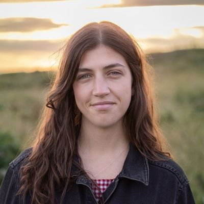 a woman looking into the camera 