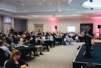 VP of Adass presenting on stage at Access Group's social care conference 2026