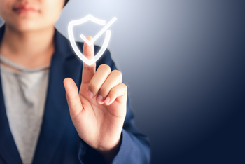 Image showing a woman ticking regualtions symbol to show the importance of the voice of the child