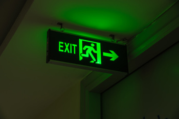 green fire exit sign