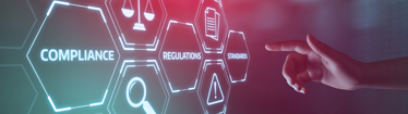 Picture illustrating the significance of compliance, regulations, and standards, with a finger pointing towards the text