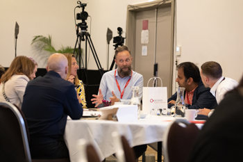 people around a table at access social care conference