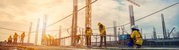 3 people on a construction site