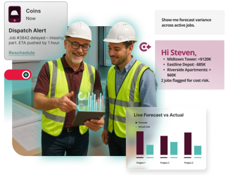 two construction workers looking at a tablet