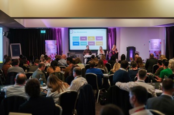 A wide angle photograph of the auditorium at the Access Healthcare Conference 2026.