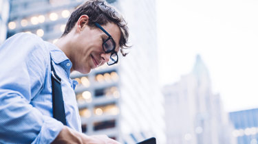 Man using mobile expense claims system