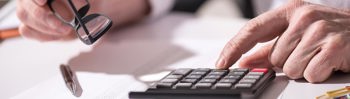 a person using a calculator