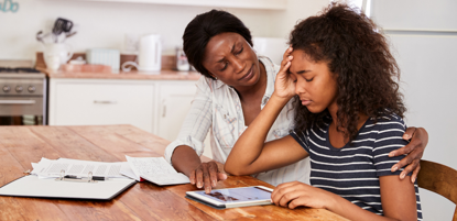 School pupil stressed out studying at home