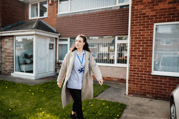 A carer leaving a house visit