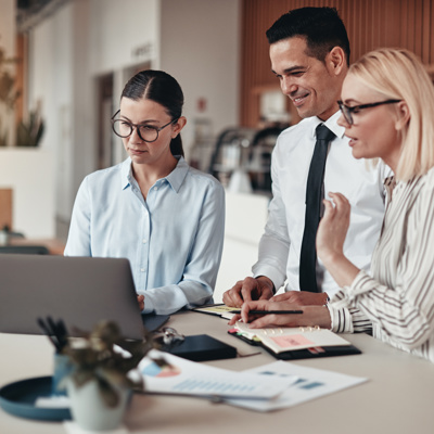 Business staff around a tablet