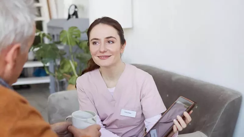 Nurse showing what is telecare 