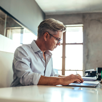 Paperless Law Firm - Man working on a laptop