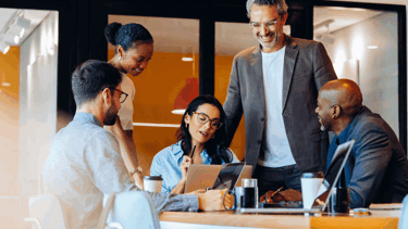 Image of team meeting in the office
