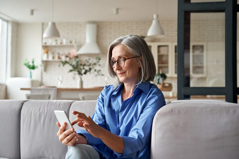 older lady looking at her phone