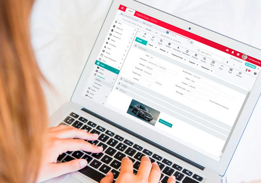 Women using Access Dimensions on laptop