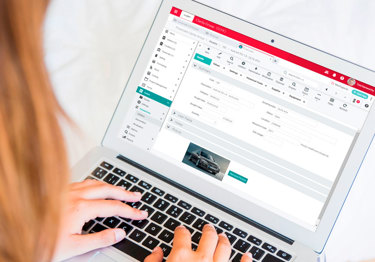 Women using Access Dimensions on laptop