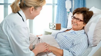A patient in a hospital bed.