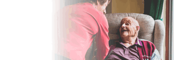 Image of unpaid carer delivering complex care to show what it is