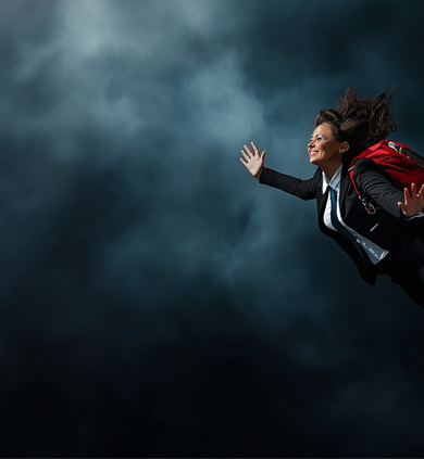 Woman in a business suit with a red backpack smiling while appearing to skydive next to promotional text about business software