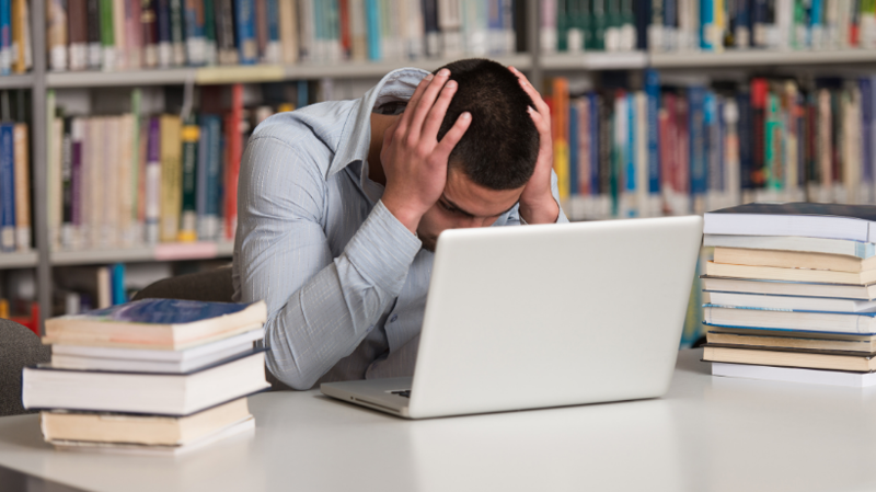Grown man stressed out by school work