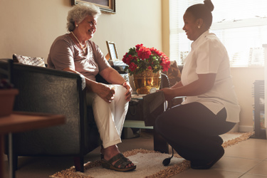 care worker and resident having a conversation