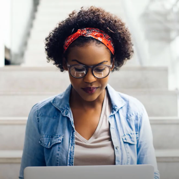 Women looking at recruitment finance software on screen